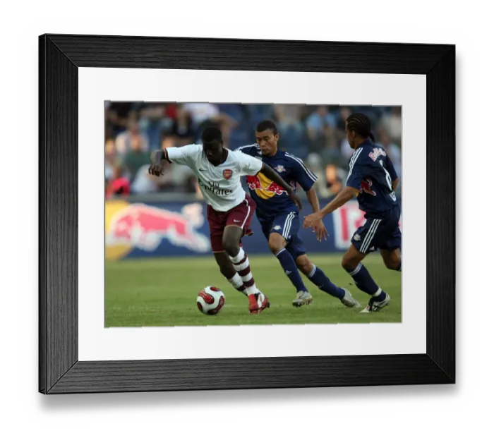 Framed Print : Emmanuel Eboue (Arsenal) Alex (Salzburg) Framed Print : Emmanuel Eboue (Arsenal) Alex (Salzburg)
