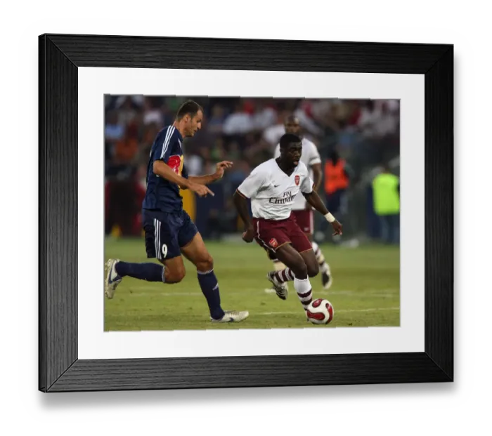 Framed Print : Kolo Toure (Arsenal) Santos (Salzburg)