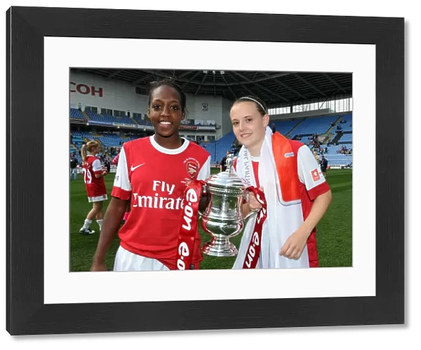 Danielle Carter and Lauren Bruton (Arsenal) with the FA Cup Trophy. Arsenal Ladies 2