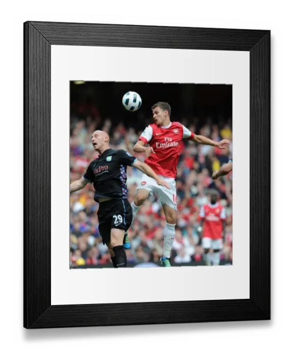 Framed Print : Aaron Ramsey (Arsenal) James Collins (Aston Villa). Arsenal 1: 2 Aston Villa