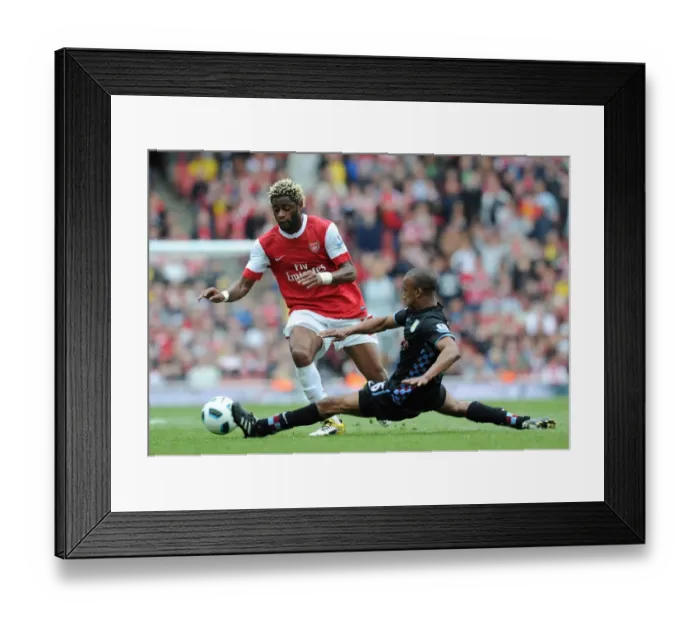 Framed Print : Alex Song (Arsenal) Fabian Delph (Villa). Arsenal 1: 2 Aston Villa. Barclays Premier League Framed Print : Alex Song (Arsenal) Fabian Delph (Villa). Arsenal 1: 2 Aston Villa. Barclays Premier League