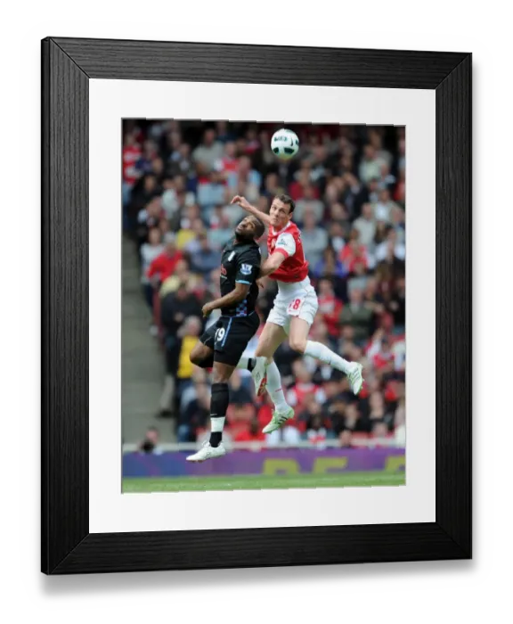 Framed Print : Sebastien Squillaci (Arsenal) Darren Bent (Villa). Arsenal 1: 2 Aston Villa