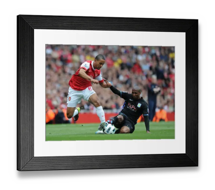 Framed Print : Theo Walcott (Arsenal) Ashley Young (Aston Villa). Arsenal 1: 2 Aston Villa