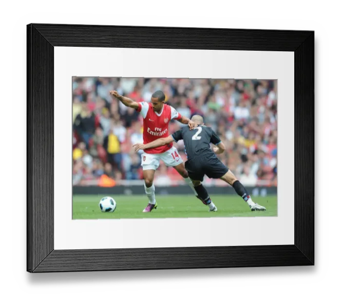 Framed Print : Theo Walcott (Arsenal) Luke Young (Aston Villa). Arsenal 1: 2 Aston Villa