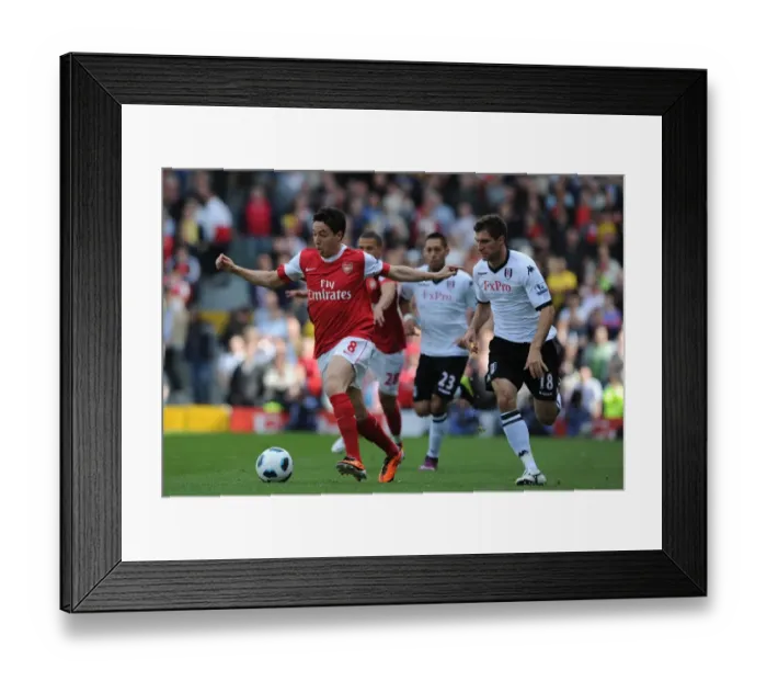 Framed Print : Samir Nasri (Arsenal) Aaron Hughes (Fulham). Fulham 2: 2 Arsenal, Barclays Premier League Framed Print : Samir Nasri (Arsenal) Aaron Hughes (Fulham). Fulham 2: 2 Arsenal, Barclays Premier League