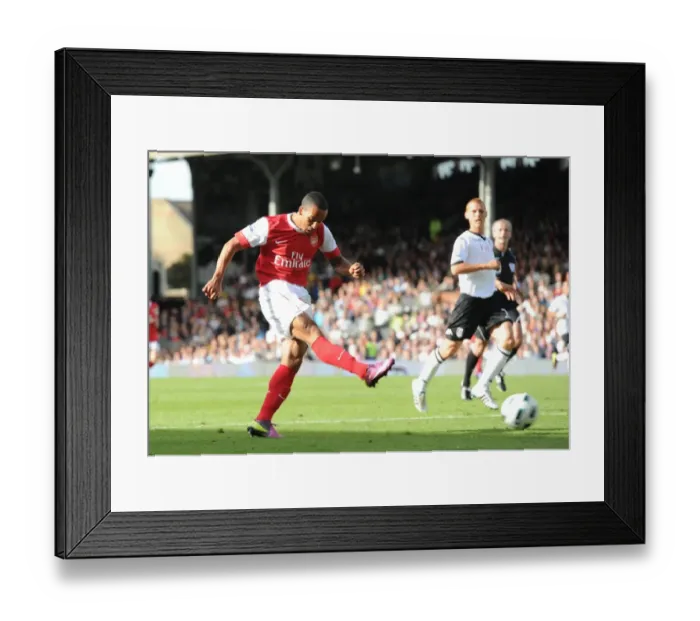 Framed Print : Theo Walcott shoots past Fulham goalkeeper Mark Schwarzer to score the 2nd Arsenal goal Framed Print : Theo Walcott shoots past Fulham goalkeeper Mark Schwarzer to score the 2nd Arsenal goal