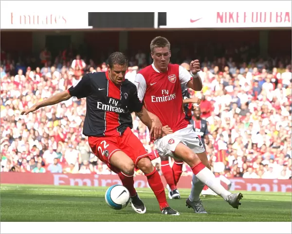 Nicklas Bendtner (Arsenal) Sylvain Armand (PSG)
