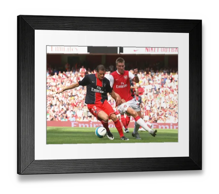 Framed Print : Nicklas Bendtner (Arsenal) Sylvain Armand (PSG)