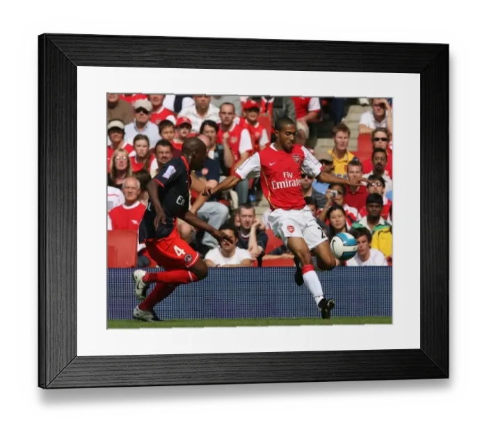 Framed Print : Gael Clichy (Arsenal) Youssuf Mulumbu (PSG) Framed Print : Gael Clichy (Arsenal) Youssuf Mulumbu (PSG)