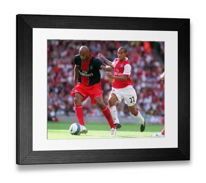 Framed Print : Gael Clichy (Arsenal) Sammy Traore (PSG) Framed Print : Gael Clichy (Arsenal) Sammy Traore (PSG)