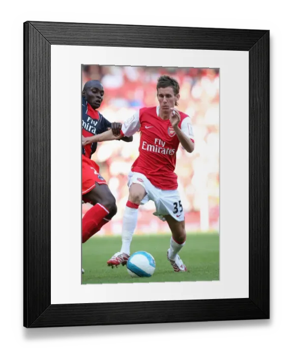 Framed Print : Mark Randall vs Granddi Ngoyi: Arsenal's Edge in the Emirates Cup Clash (2007)