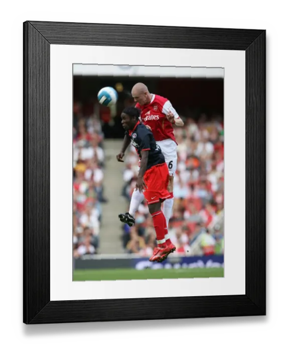 Framed Print : Philippe Senderos (Arsenal) Peguy Luyindula (PSG) Framed Print : Philippe Senderos (Arsenal) Peguy Luyindula (PSG)