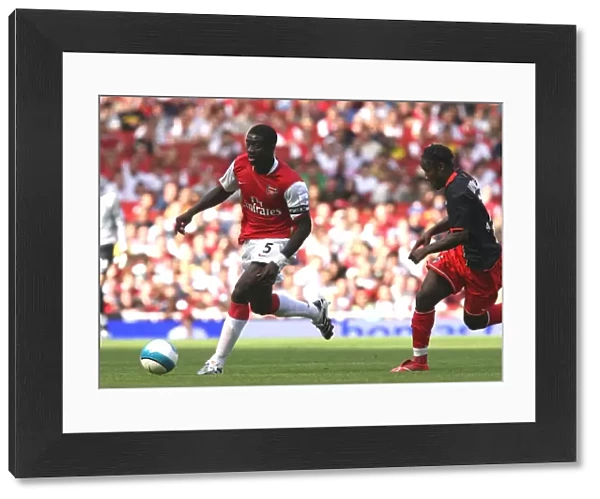 Kolo Toure (Arsenal) Peguy Luyindula (PSG)