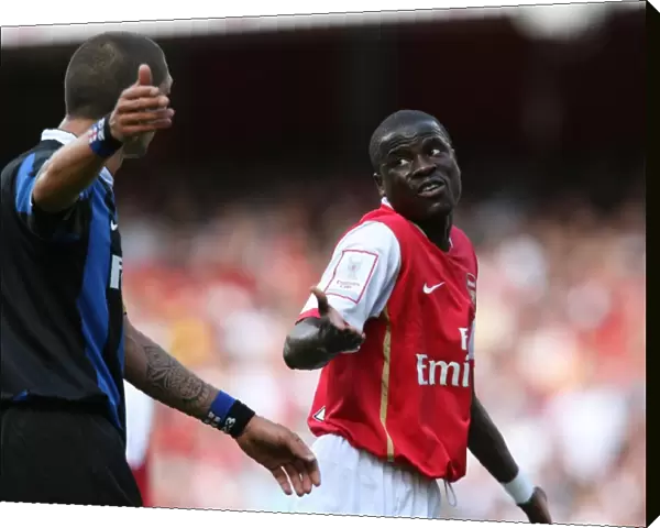 Emmanuel Eboue (Arsenal) Marco Materazzi (Inter)
