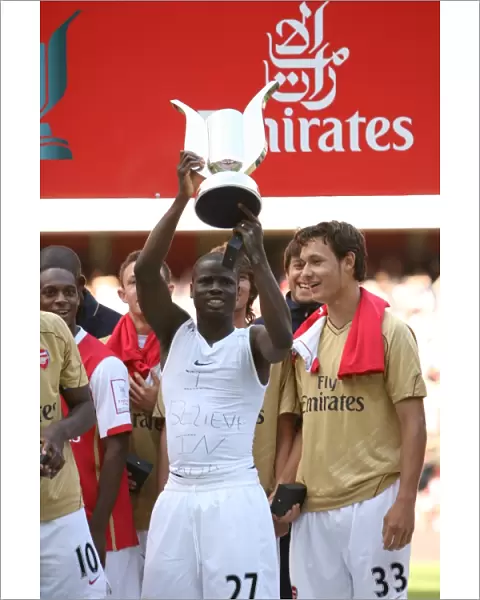 Emmauel Eboue (Arsenal) with the Emirates Trophy