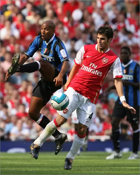 Cecs Fabregas (Arsenal) Olivier Dacourt (Inter)