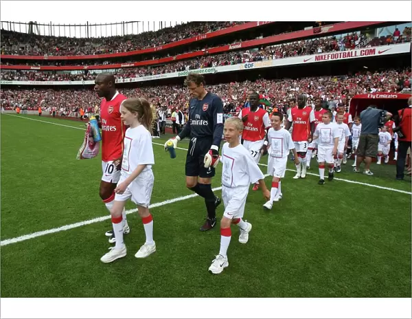 William Gallas and Jens Lehmann lead out the Arsenal team