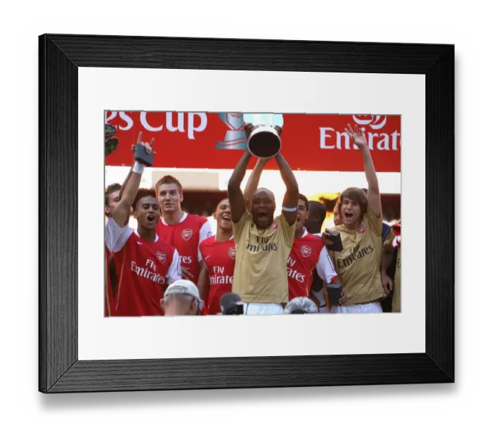 Framed Print : William Gallas Celebrates with the Emirates Trophy: Arsenal's Victory over Inter Milan (2007) Framed Print : William Gallas Celebrates with the Emirates Trophy: Arsenal's Victory over Inter Milan (2007)