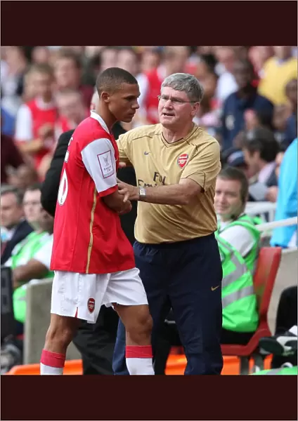 Kieran Gibbs (Arsenal) and Assistant Manager Pat Rice