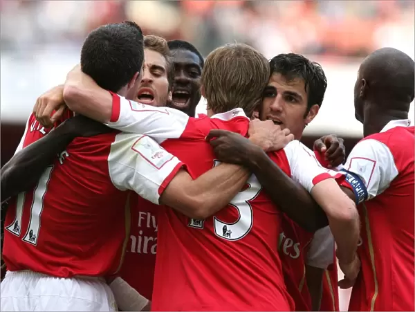 Alex Hleb celebrates scoring Arsenals 1st goal