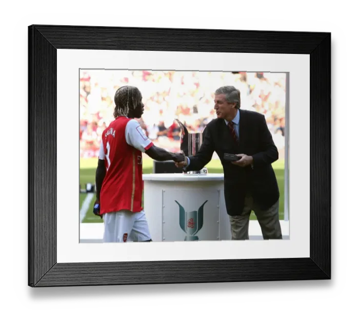 Framed Print : Bacary Sagna (Arsenal) picks up his medal Framed Print : Bacary Sagna (Arsenal) picks up his medal