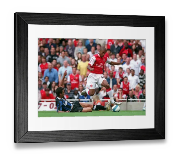 Framed Print : Armand Traore (Arsenal) Cristian Chivu (Inter)