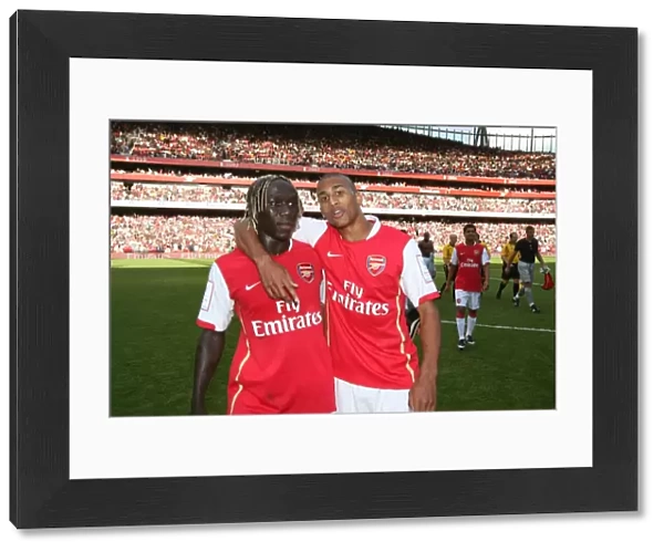 Bacary Sagna and Armand Traore (Arsenal)