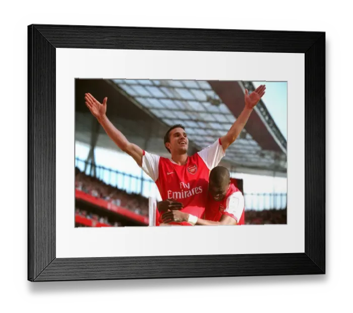 Framed Print : Robin van Persie and Emmanuel Eboue: Arsenal's Unstoppable Duo Celebrates 2-1 Over Inter Milan Framed Print : Robin van Persie and Emmanuel Eboue: Arsenal's Unstoppable Duo Celebrates 2-1 Over Inter Milan