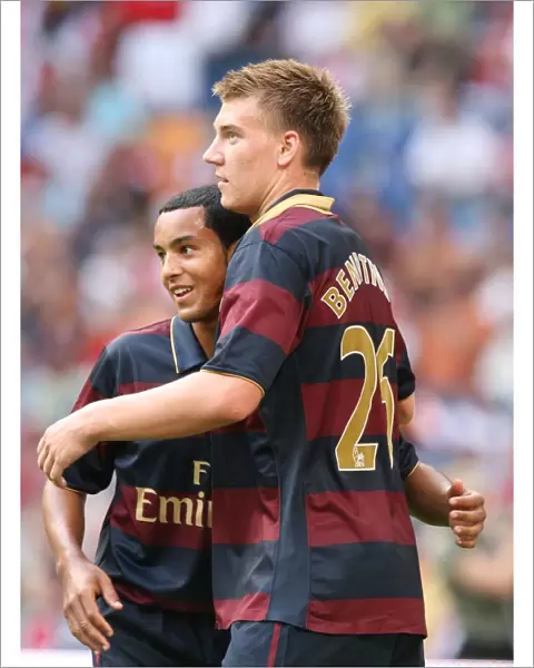 Nicklas Bendtner celebrates scoring Arsenals 1st goal with Theo Walcott