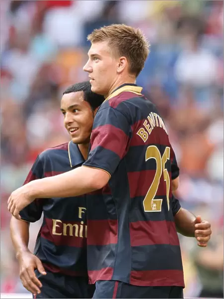 Nicklas Bendtner celebrates scoring Arsenals 1st goal with Theo Walcott
