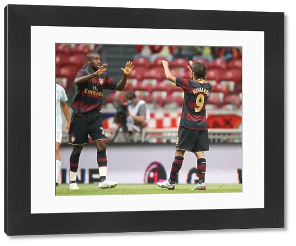 Eduardo celebrates scoring the 2nd Arsenal goal with Johan Djourou