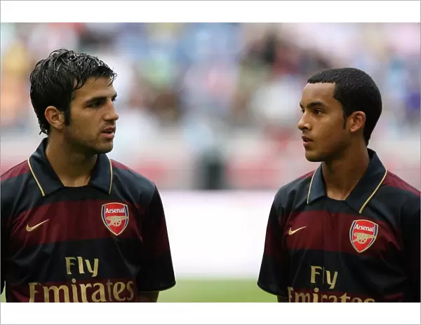 Cesc Fabregas and Theo Walcott (Arsenal)