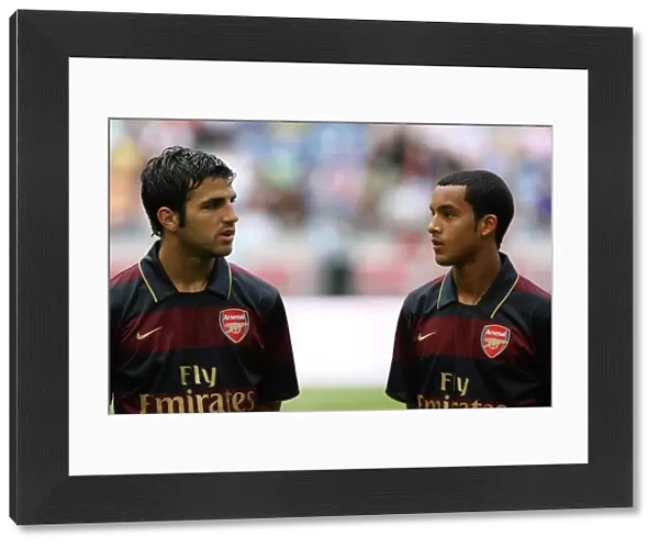 Cesc Fabregas and Theo Walcott (Arsenal)