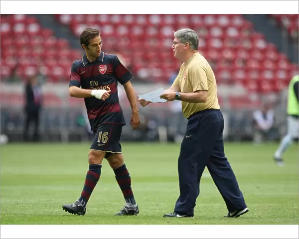 Pat Rice Arsenal Assistant Manager give Mathieu Flamini