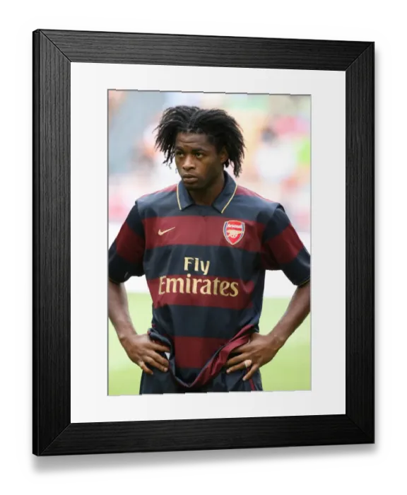 Framed Print : Alex Song in Action: Arsenal's 2:1 Win Against Lazio at Amsterdam ArenA (2007) Framed Print : Alex Song in Action: Arsenal's 2:1 Win Against Lazio at Amsterdam ArenA (2007)