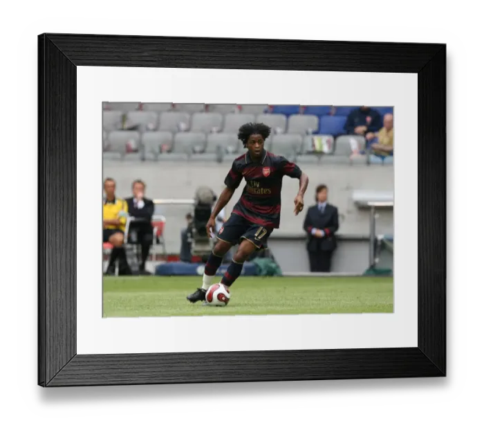 Framed Print : Alex Song in Action: Arsenal's 2-1 Win Over Lazio at Amsterdam ArenA (2007) Framed Print : Alex Song in Action: Arsenal's 2-1 Win Over Lazio at Amsterdam ArenA (2007)