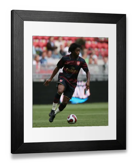 Framed Print : Alex Song's Performance: Arsenal's Victory Over Lazio at Amsterdam ArenA (2007) - 2-1