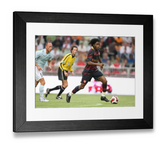 Framed Print : Alex Song (Arsenal) Massimo Mutarelli (Lazio) Framed Print : Alex Song (Arsenal) Massimo Mutarelli (Lazio)