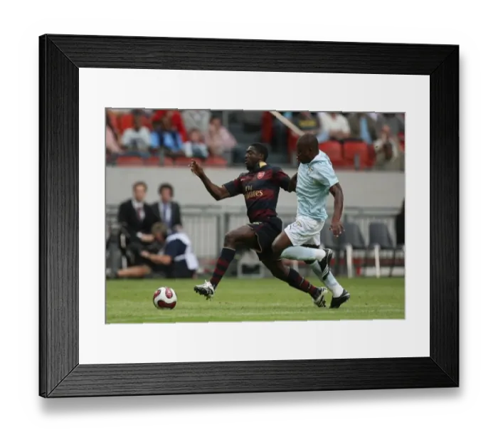 Framed Print : Kolo Toure (Arsenal) Gaby Mudingayi (Lazio)