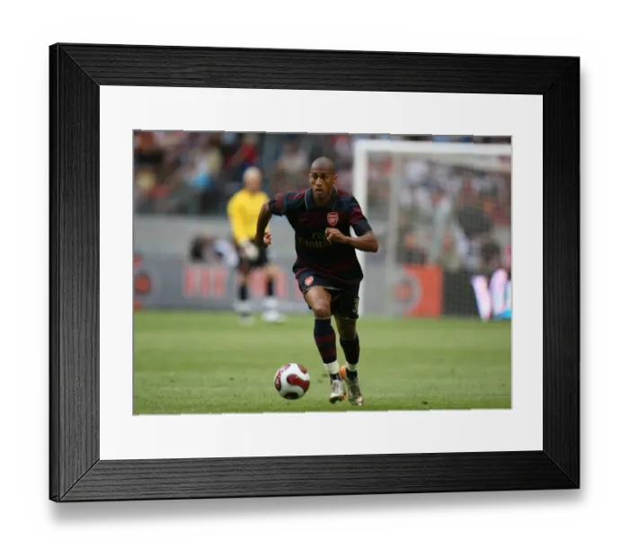 Framed Print : Armand Traore's Debut Shines: Arsenal's Victory Over Lazio at Amsterdam ArenA (2007)