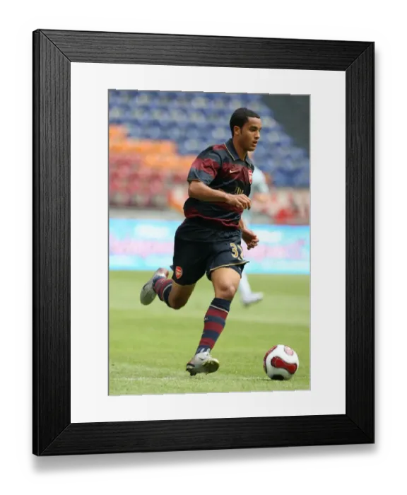 Framed Print : Theo Walcott's Thriller: Arsenal's Winning Goal Against Lazio at Amsterdam ArenA (2007) Framed Print : Theo Walcott's Thriller: Arsenal's Winning Goal Against Lazio at Amsterdam ArenA (2007)
