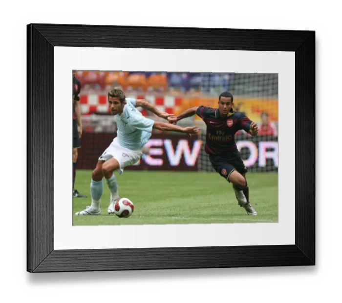 Framed Print : Theo Walcott (Arsenal) Valon Behrami (Lazio)