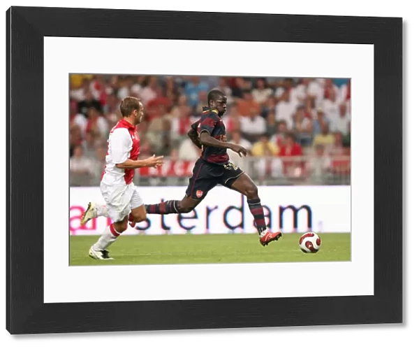 Manu Eboue (Arsenal) Wesley Sneijder (Ajax)