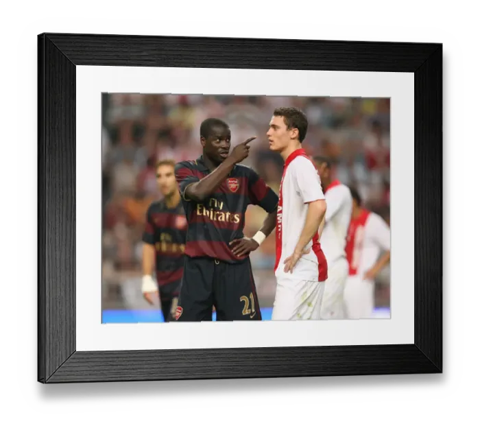 Framed Print : Manu Eboue (Arsenal) Thomas Vermaelen (Ajax) Framed Print : Manu Eboue (Arsenal) Thomas Vermaelen (Ajax)