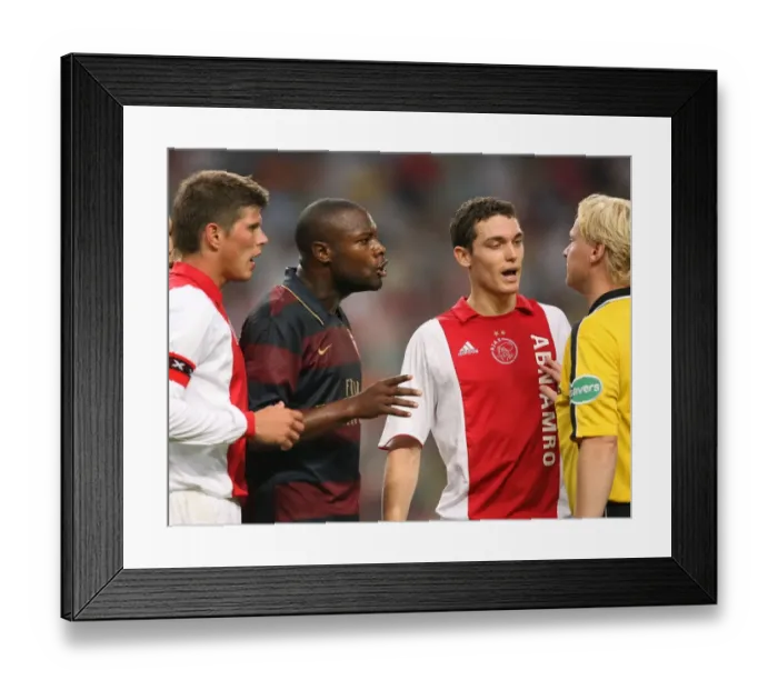 Framed Print : Arsenal captain William Gallas and Ajax defender Thomas Vermaelen talk to the referee Framed Print : Arsenal captain William Gallas and Ajax defender Thomas Vermaelen talk to the referee