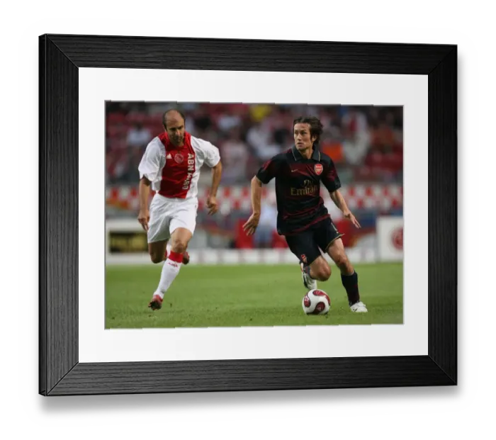 Framed Print : Tomas Rosicky (Arsenal) Kennedy Bakircioglu (Ajax) Framed Print : Tomas Rosicky (Arsenal) Kennedy Bakircioglu (Ajax)