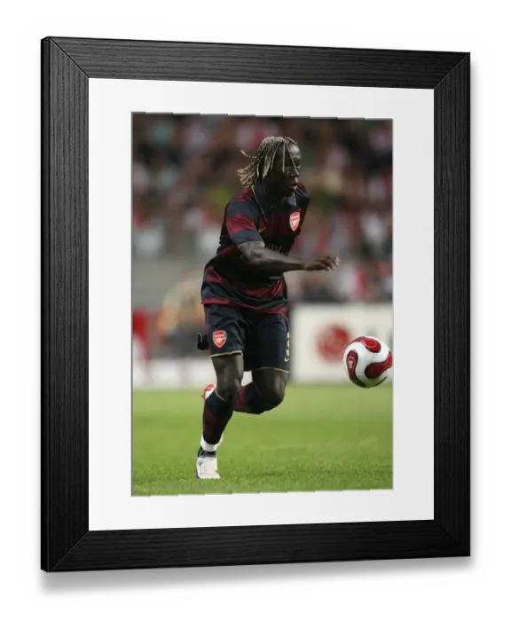 Framed Print : Bacary Sagna's Triumph: Arsenal's 1-0 Victory Over Ajax at ArenA, Amsterdam (April 8, 2007)