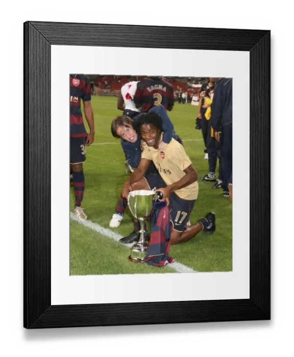 Framed Print : Alex Song and Tomas Rosicky celebrate the Arsenal victory Framed Print : Alex Song and Tomas Rosicky celebrate the Arsenal victory