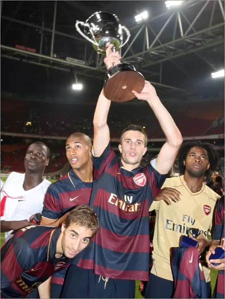 Arsenal's Victory Celebration: Robin van Persie, Mathieu Flamini, Armand Traore, and Alex Song