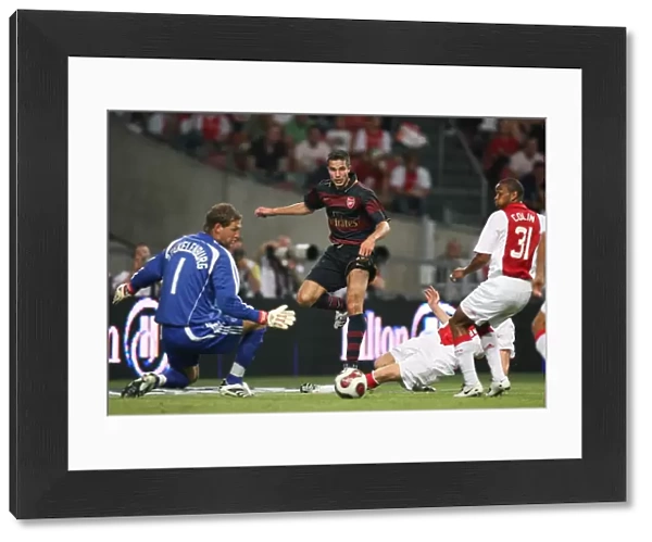 Robin van Persie (Arsenal) Maarten Stekelenburg and Colin (Ajax)